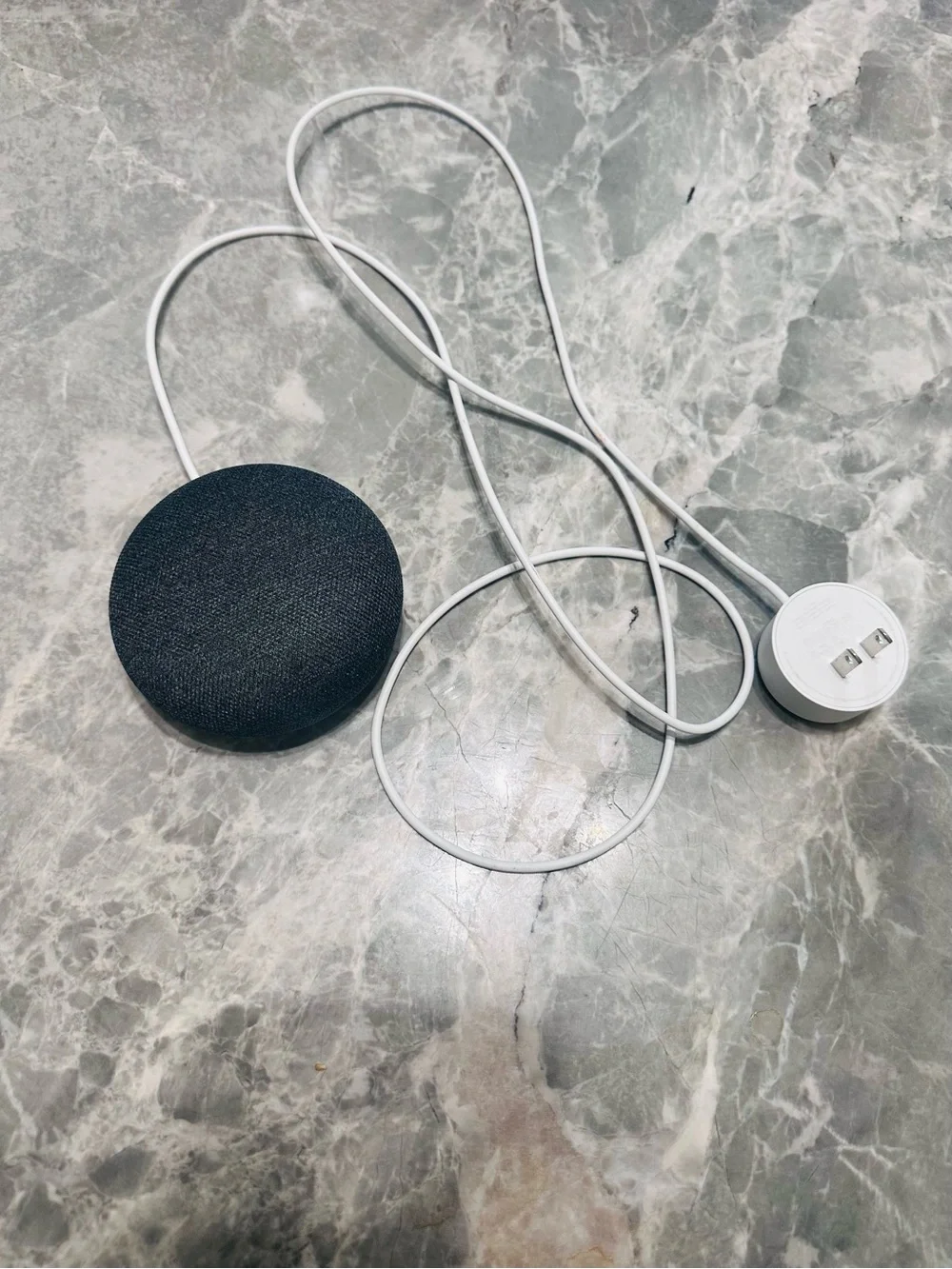 Google Smart Speaker with Bright Orange Top and Dark Gray Body